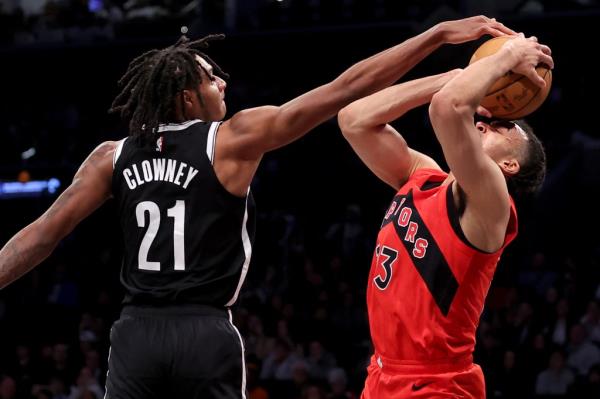 Noah Clowney blocks a shot by Toro<em></em>nto Raptors forward Jordan Nwora.