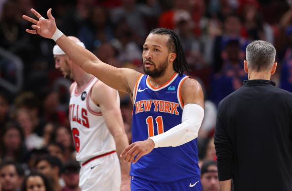 Jalen Brunson's Knicks have clinched a top-6  spot in the playoffs after the Heat lost to the Mavericks on Wednesday night in Miami.