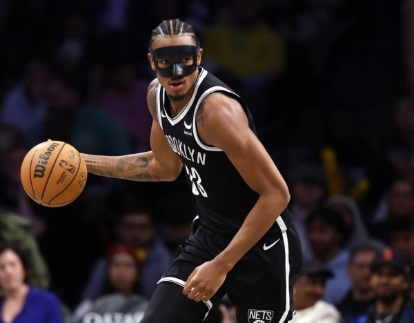 Nic Claxton, who scored 14 points, looks to make a move during the Nets' win. 