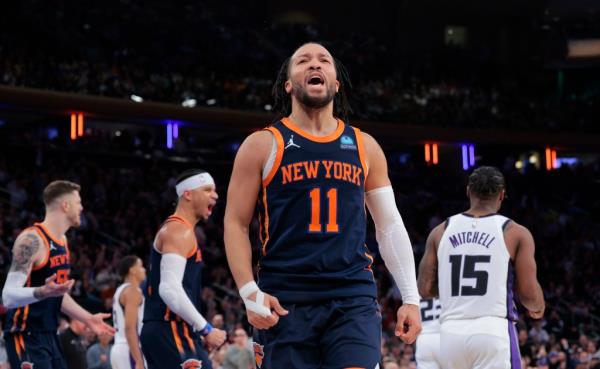 Knicks guard Jalen Brunson #11 reacts after he scores and draws a foul during the fourth quarter