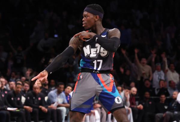 Dennis Schroder, who scored 24 points, celebrates after hitting a 3-pointer during the Nets' win.