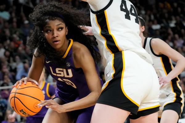 LSU forward Angel Reese (10) drives around Iowa forward Addison O'Grady (44) during the fourth quarter of an Elite Eight round college basketball game during the NCAA Tournament, Monday, April 1, 2024, in Albany, N.Y.  