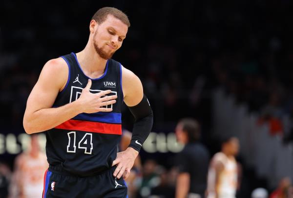 Malachi Flynn #18 of the Detroit Pistons reacts during a timeout against the Atlanta Hawks inthe second quarter at State Farm Arena on April 03, 2024 in Atlanta, Georgia. 