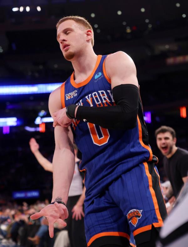 Do<em></em>nte DiVincenzo #0 of the New York Knicks reacts after hitting a there point shot during the first half when the New York Knicks played the Brooklyn Nets Saturday, March 23, 2024 at Madison Square Garden