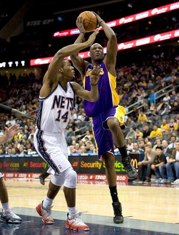 Lakers forward Lamar Odom goes up for a shot against the New Jersey Nets at The Prudential Center. 