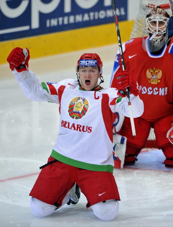 Ko<em></em>nstantin Koltsov celebrates a goal while playing for Belarus during the 2009 IIHF world championship.