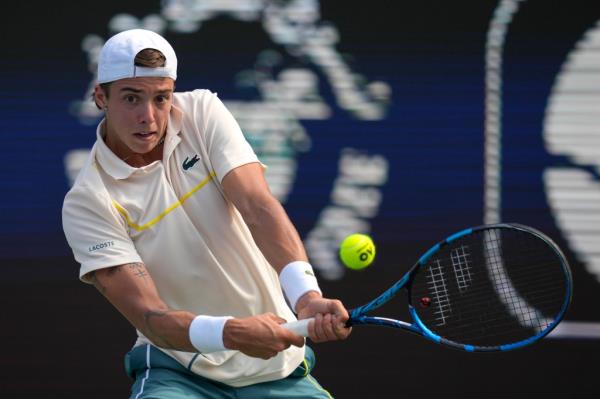 Arthur Cazaux of France returns the ball to Andrey Rublev during a match of the Dubai Duty Free Tennis Champio<em></em>nships in Dubai, United Arab Emirates