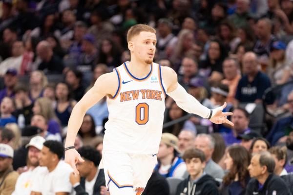 Do<em></em>nte DiVincenzo of the New York Knicks celebrates making a three-pointer against the Sacramento Kings at Golden 1 Center.