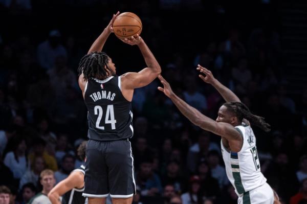 Cam Thomas shoots during the Nets' loss to the Bucks on Oct. 27, 2024. 