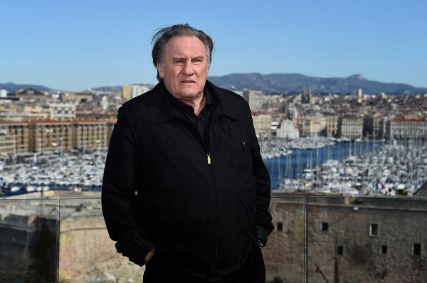 Gerard Depardieu poses during a photocall for the second season of the French TV show "Marseille" broadcasted and co-produced by US streaming video giant Netflix, on February 18, 2018 in Marseille, southern France